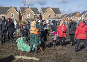 Community members of Oakley Vale planting trees